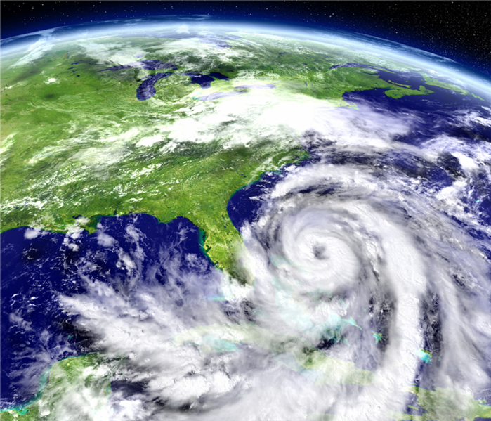 A satellite image of a hurricane on the east coast of the United States.